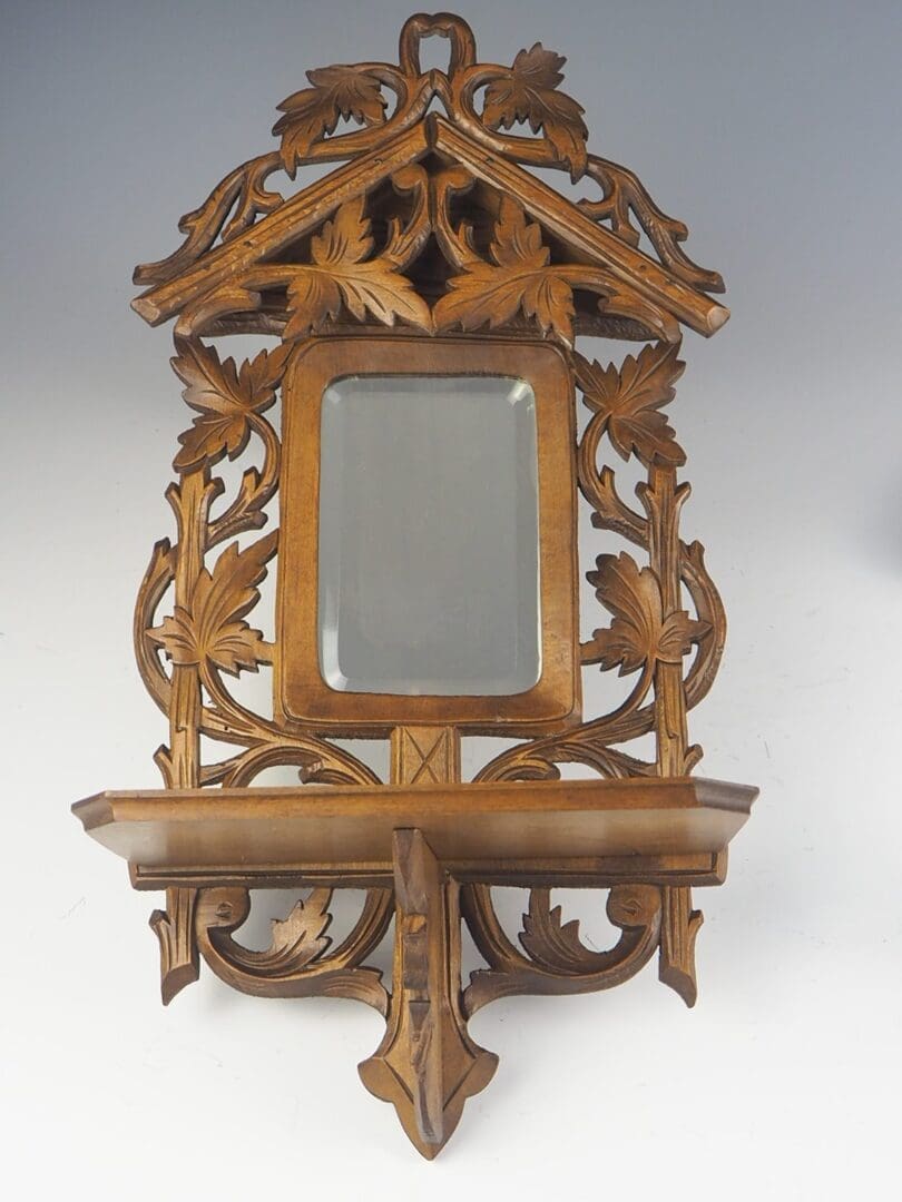 Antique Mirrors. Black Forest Carved Wood Console Mirrors.